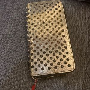 Louboutin gold spiked wallet